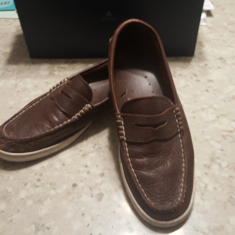 Cole Haan brown loafers.